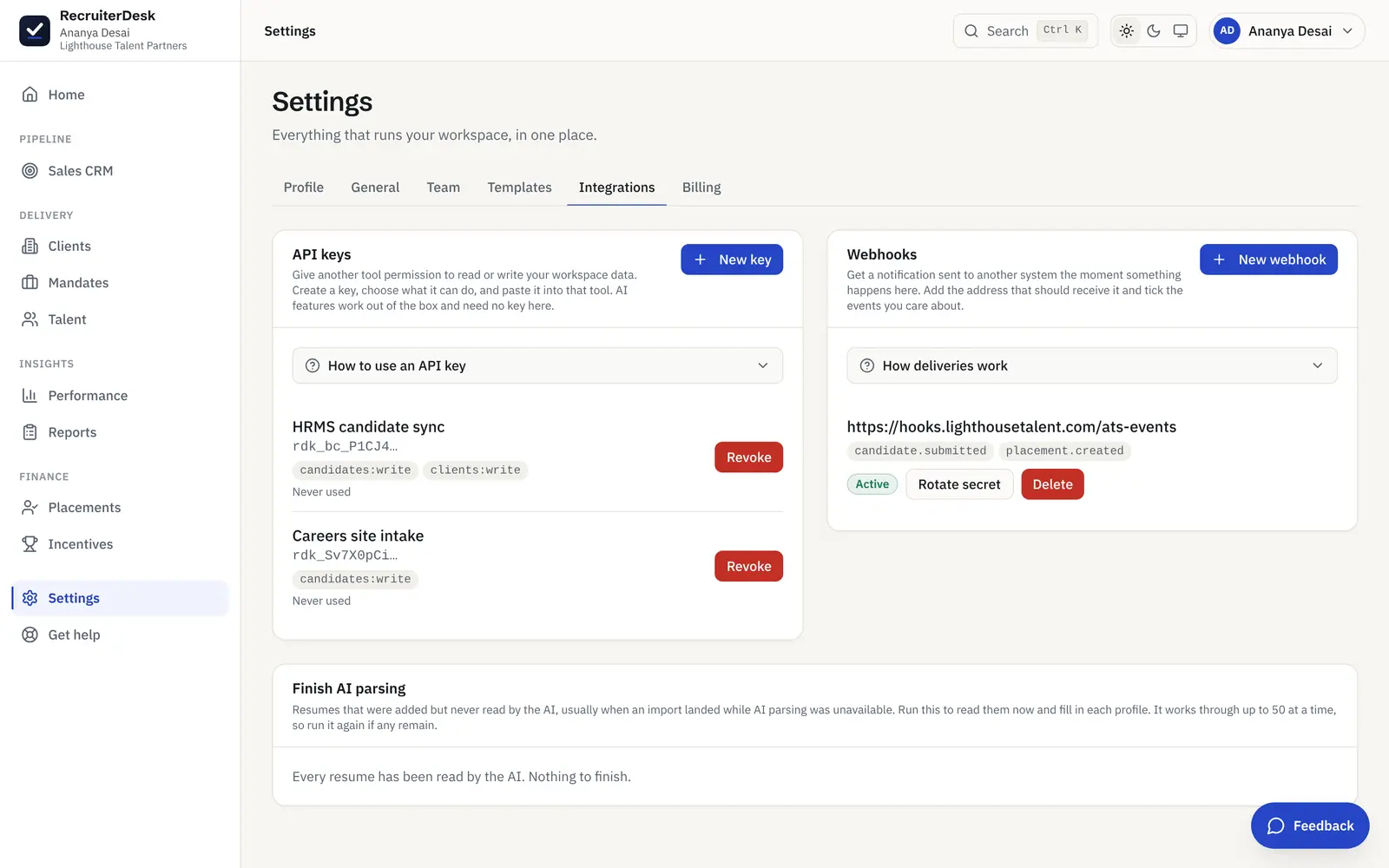 The Integrations settings in RecruiterDesk: scoped API keys and a webhook subscribed to candidate and placement events.